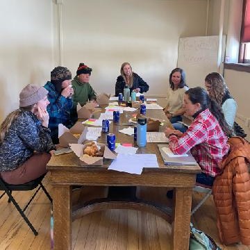 image of group of people at table