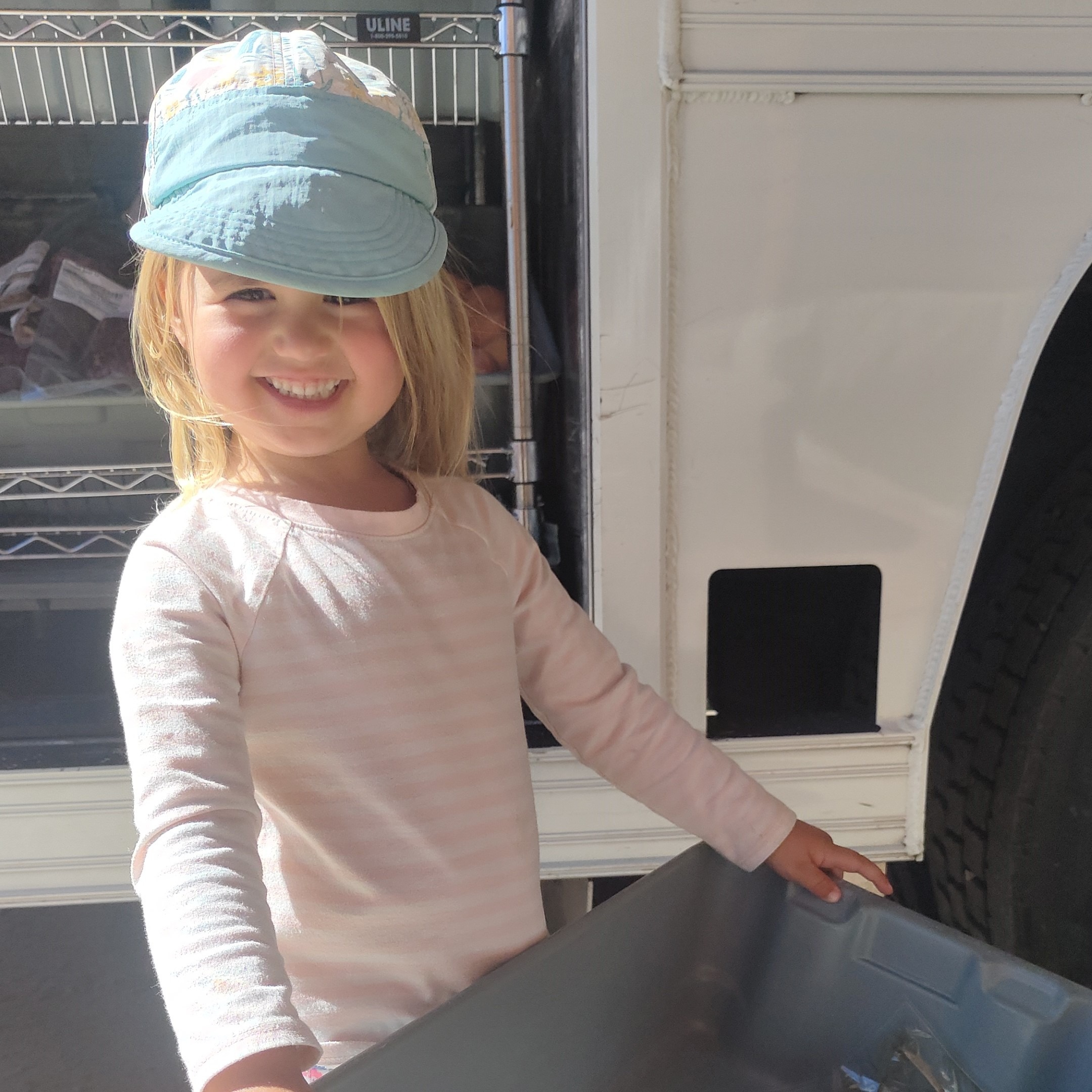 image of small girl at Mobile Market