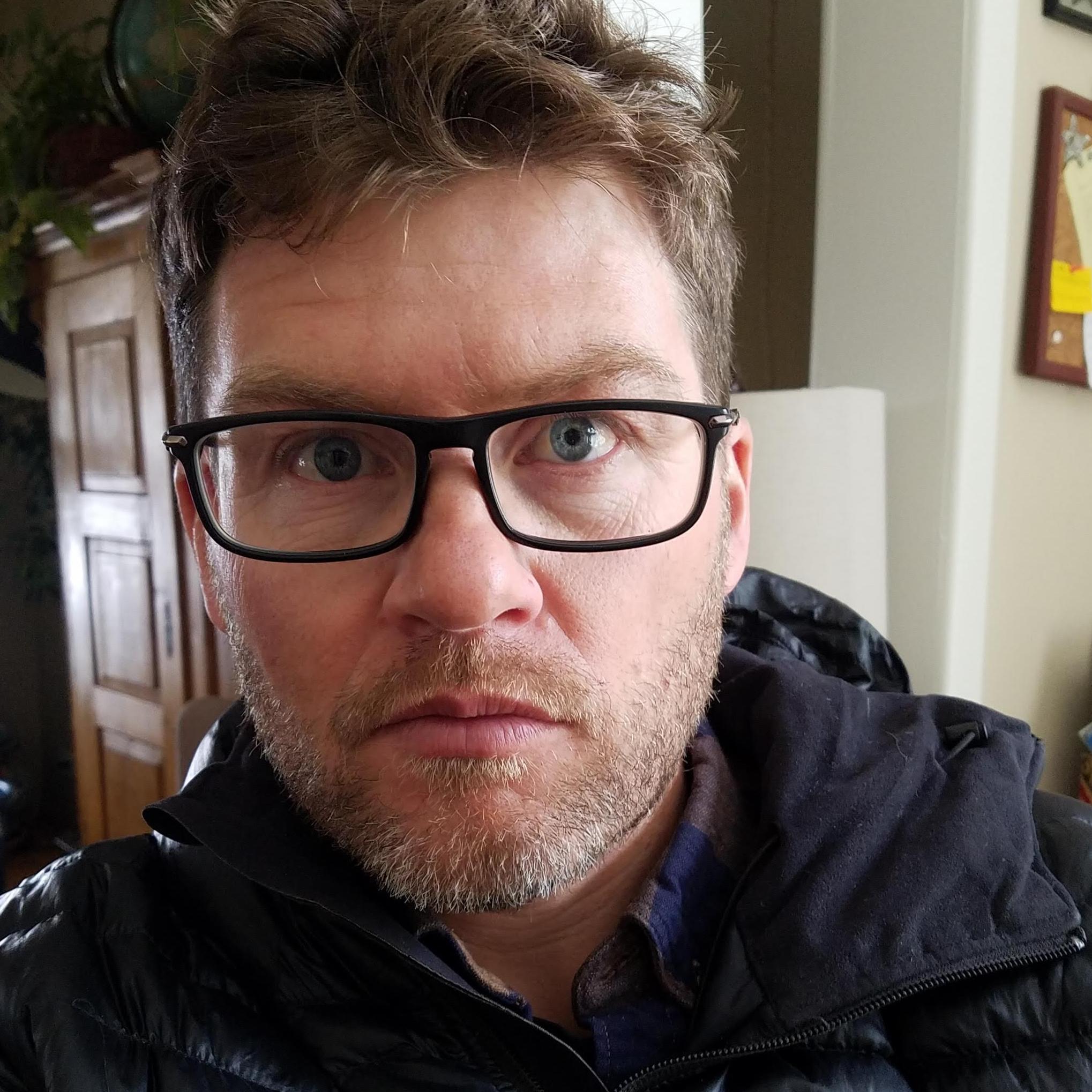 headshot of Rob Roof