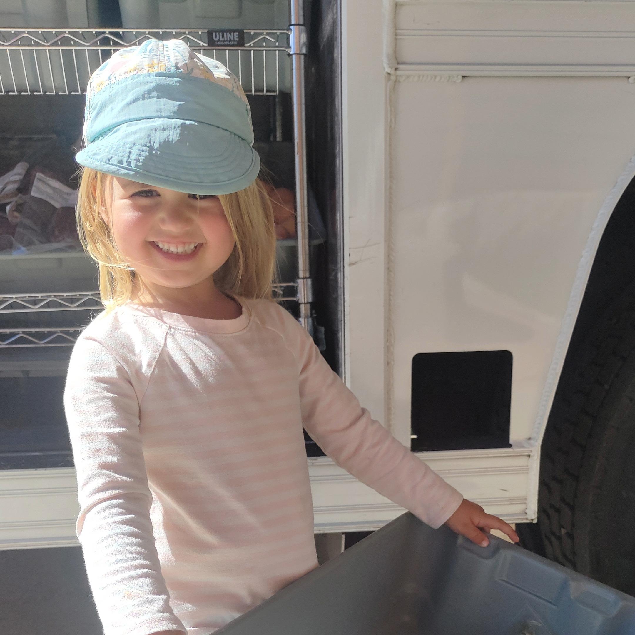 girl at Mobile Market